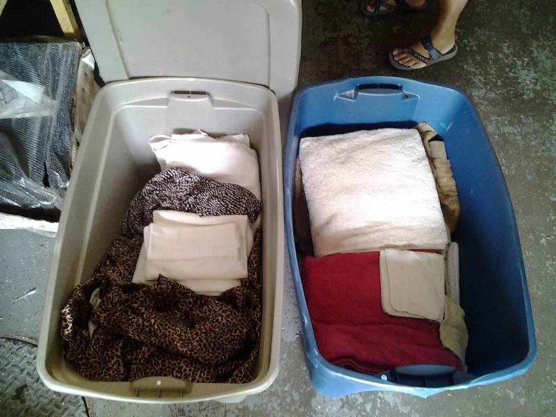 lot 65 image: 2-30 Gal. Sterilite Totes (One With Lid), One Full Of Towels, One Full, Of Bedding (Sheets)