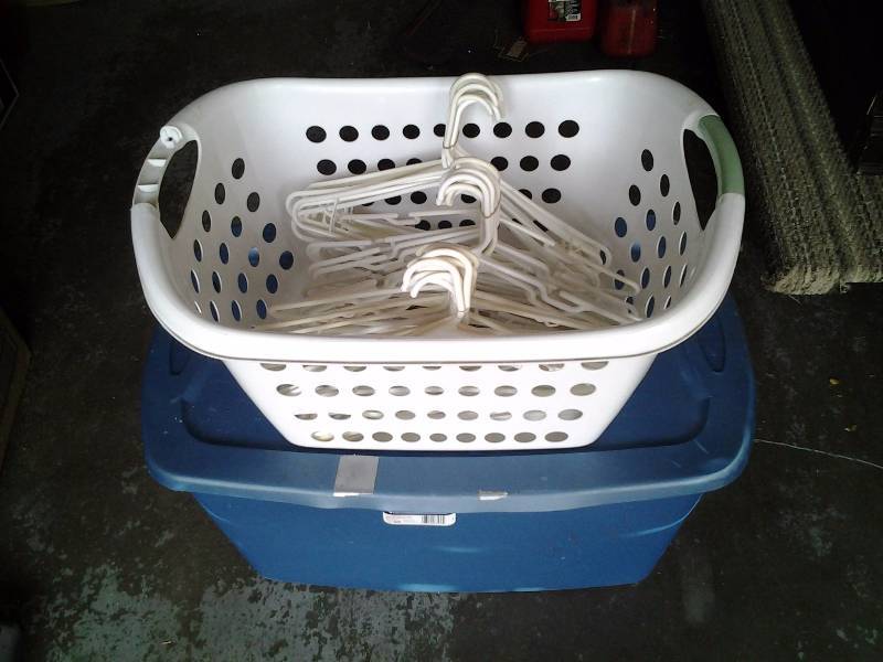 lot 66 image: 30 Gal. Sterilite Tote With Lid, Laundry Basket, 4-Dozen Hangers