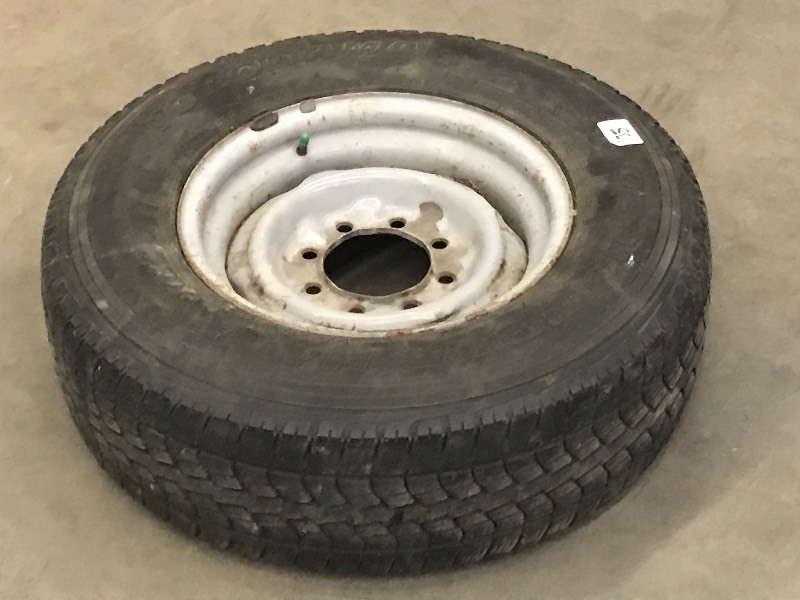 lot 135 image: 8-Lug Steel Wheel With Yokohama LT2...