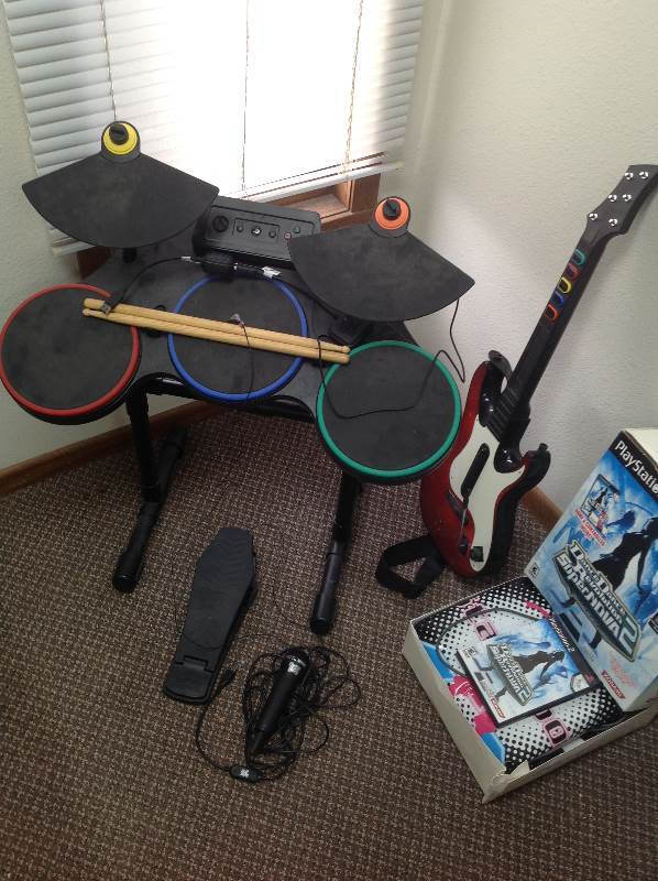 lot 29 image: Guitar Hero, and Dance Dance Revolution for PS2