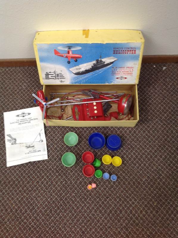 lot 42 image: Remote Control Helicopter, and Toy Barrels