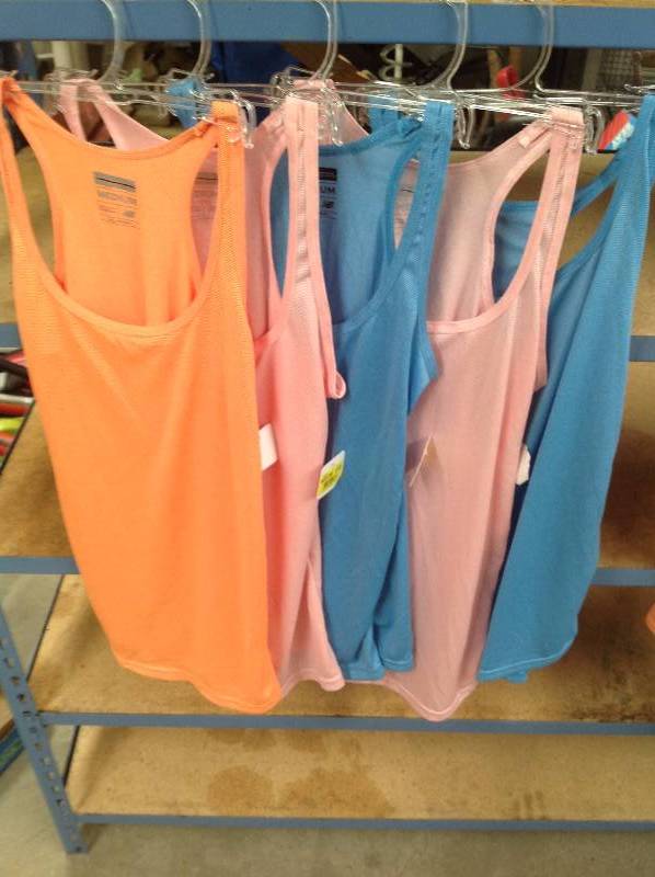lot 82 image: 5 New Balance Revolution in Motion tank tops Medium, new with tags.