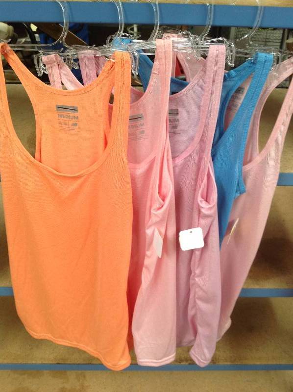 lot 83 image: 5 New Balance Revolution in Motion tank tops Medium, new with tags.