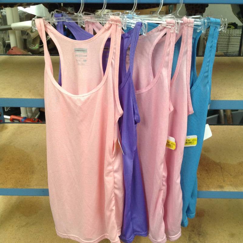 lot 84 image: 5 New Balance Revolution in Motion tank tops Medium, new with tags.