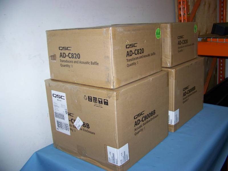 lot 69 image: (2) QSC, Ceiling Mount, Loudspeakers  Speakers and (2) QSC, Backbox Enclosures - NEW IN BOX