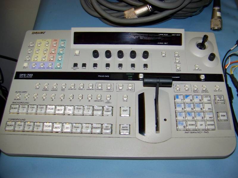 lot 58 image: (3) Sony, Camera Control Units, (3) Remote Control Units, (1) DME Switcher and (3) 32 Camera Cables with other Misc. Cables