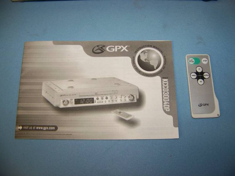 lot 120 image: GPX, Under-The-Counter Mount, CDAMFM Weatherband Digital Clock Radio