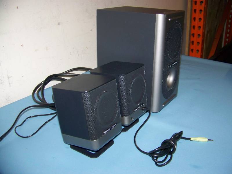 lot 49 image: Altec Lansing, Amplified Speaker System including (2) Speakers on Stands and (1) Subwoofer