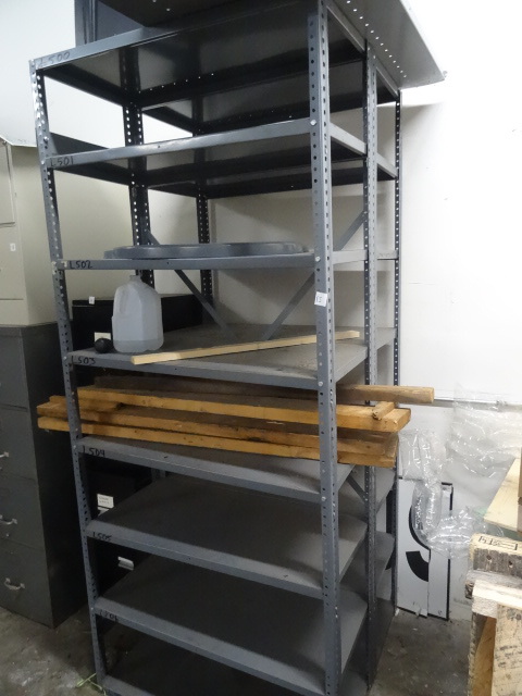 2 sections of metal shelving. Bolte...