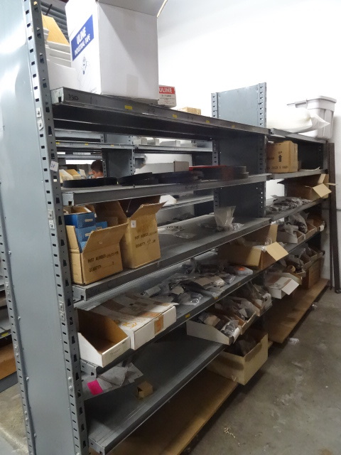 Metal shelving unit. 2 sections. 14...