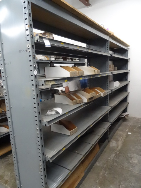 Metal shelving unit. 2 sections. 14...