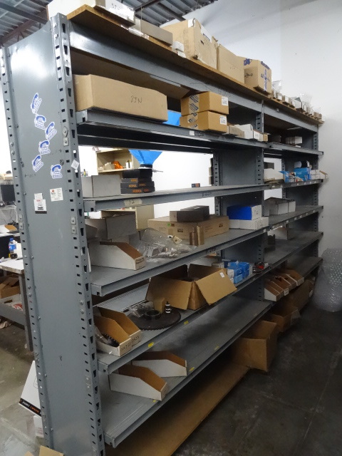 Metal shelving unit. 2 sections. 14...