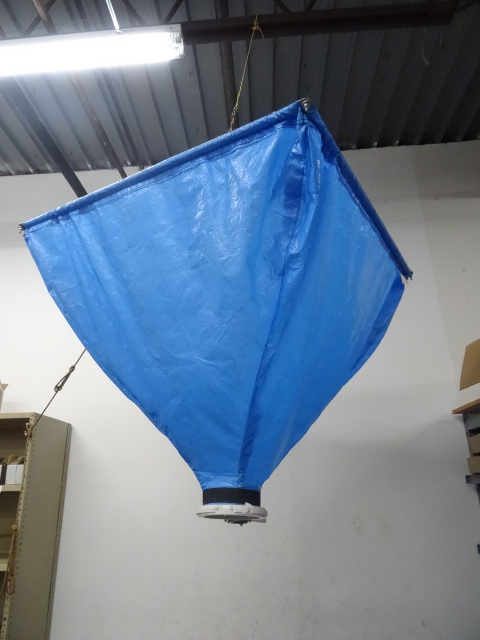 Ceiling hung packing peanut dispens...