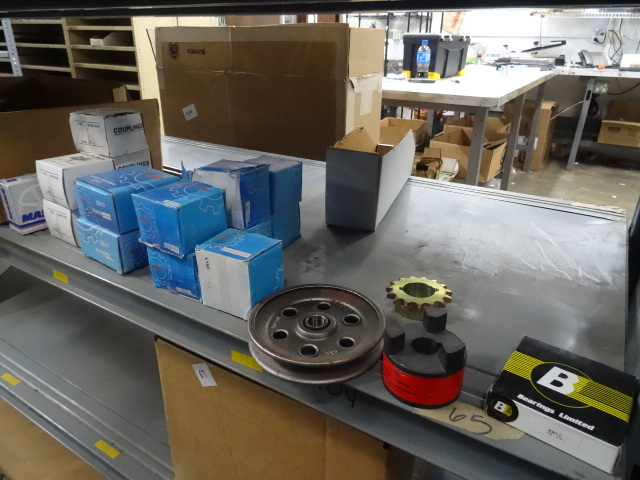 Shelf of misc sprockets. Couplers a...