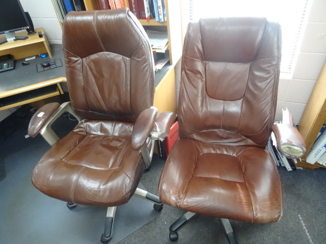 2 matching office chairs on wheels....