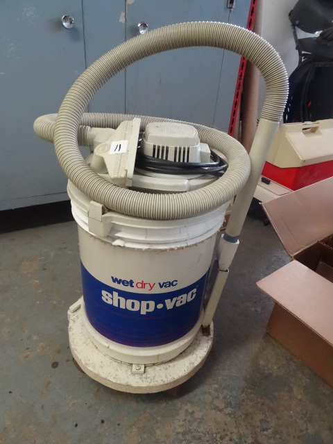 lot 11 image: Wet dry shop vac on wheels...