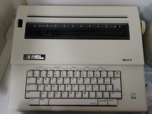 lot 112 image: Smith Corona electric type writer. ...