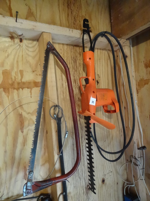 lot 133 image: Bow saw and electric hedge trimmerW...