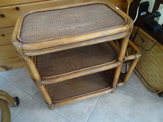 lot 181 image: Bamboo end table with magazine hold...