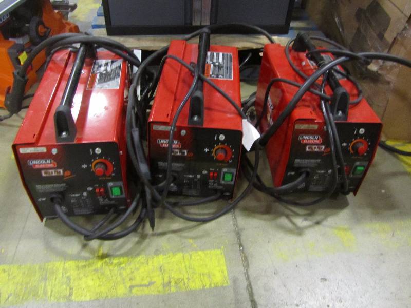 Pallet of used and damaged Lincoln Electric welders