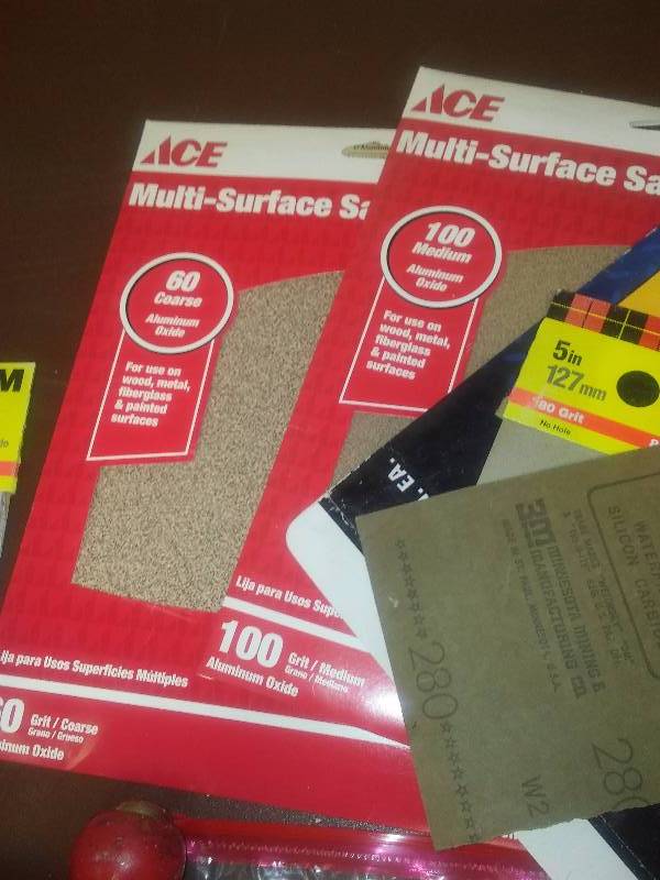 lot 5 image: Paint Supply Lot, tray, roller covers, roller frame, LOTS of sand paper assortment and more
