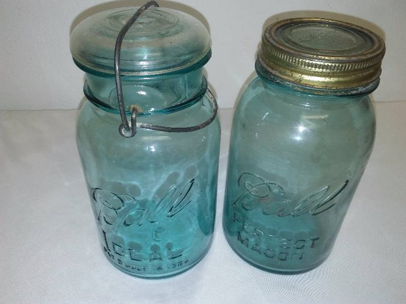 lot 55 image: Vintage Blue Ball Mason Jars (2) one with bail and glass lid, one with ring and Kerr glass lid