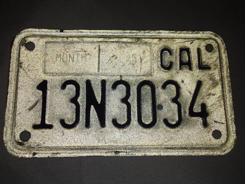 lot 63 image: California License Plate  never used, near perfect