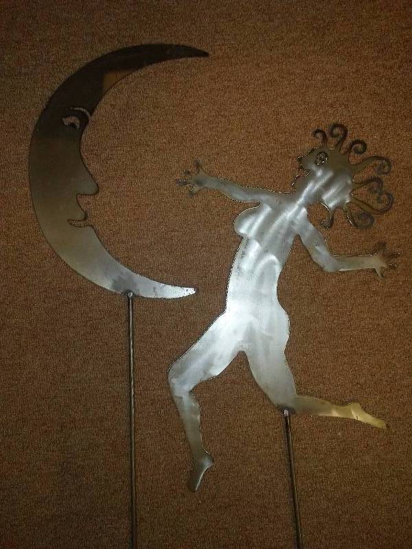 lot 74 image: Aztec Metal Yard Garden Art, (2) Moon and Dancing Temptress, 55 tall