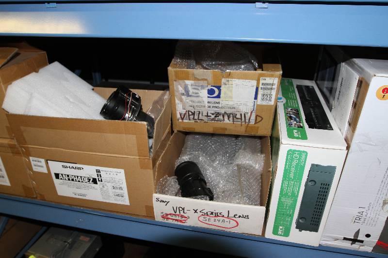 lot 82 image: Shelf Lot - Pro Audio & Video Projector Lenses, Miscellaneous New Extron & More