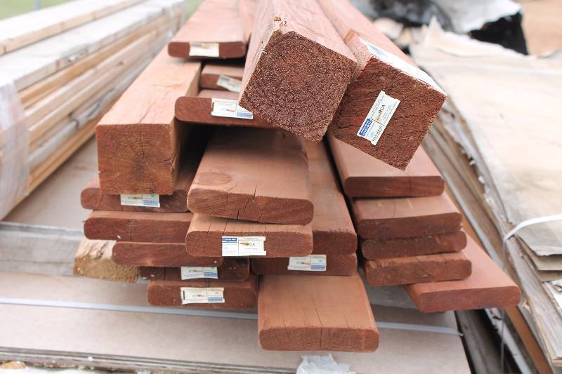 Lot of (Approximately 20) Brown Treated Lumber