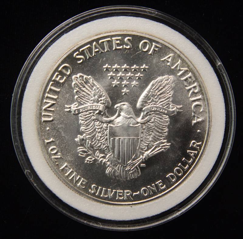 1987 AMERICAN SILVER EAGLE 1 TROY OZ. .999 FINE SILVER IN AIRTITE