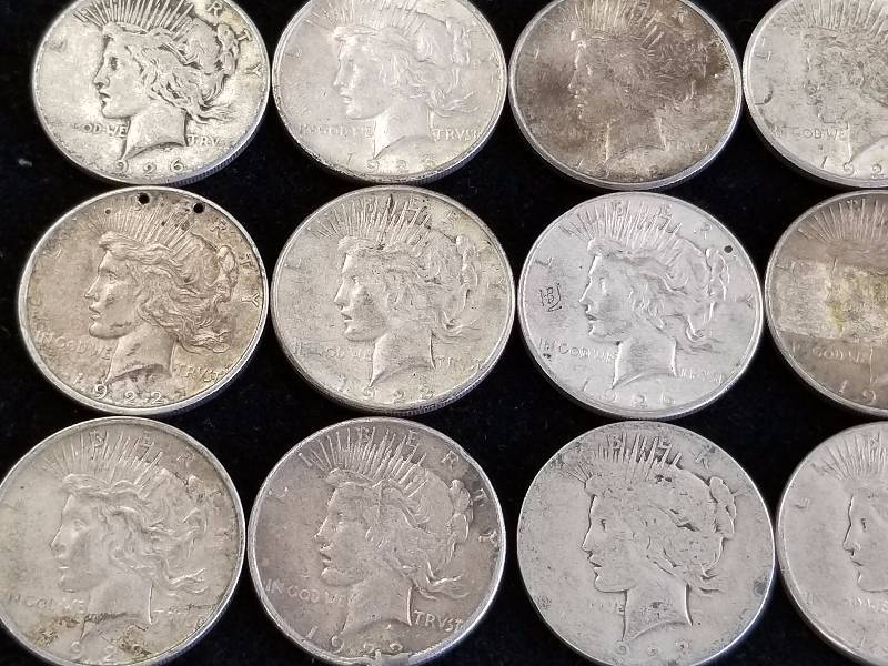 GROUP OF 15 US PEACE SILVER DOLLARS AS PICTURED