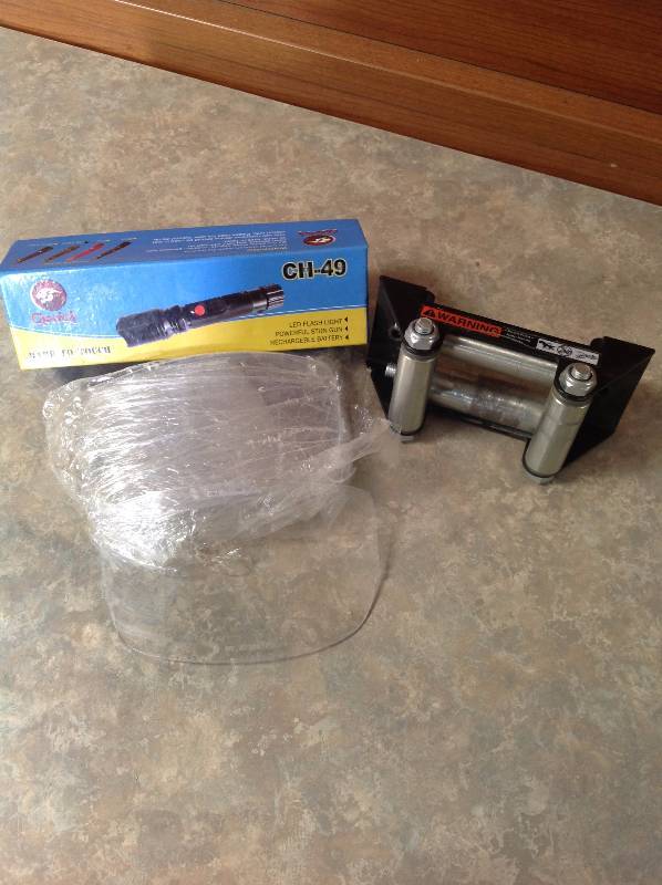 led flashlight stun gun, cable winch guide, welding glass shield