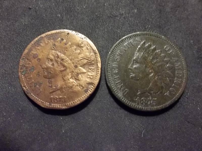 1873, 1975 Indian Head Cents