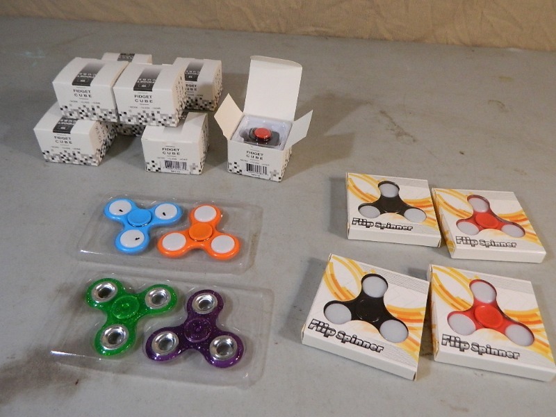 lot 15 image: New Fidget Spinners and Cube Spinners