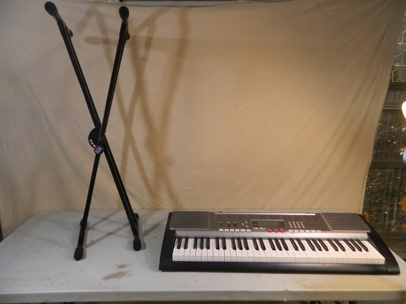 lot 49 image: Casio Keyboard and Stand