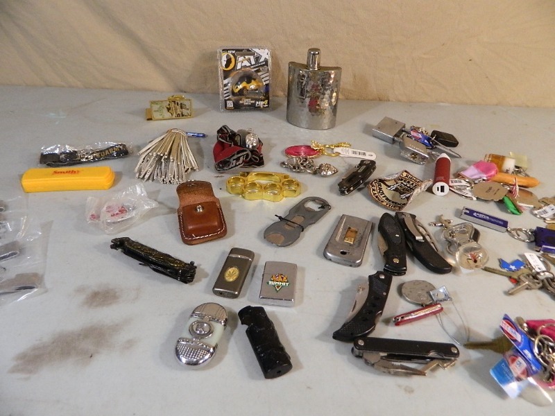 lot 55 image: New Head Blade, Summit Zippo, and More