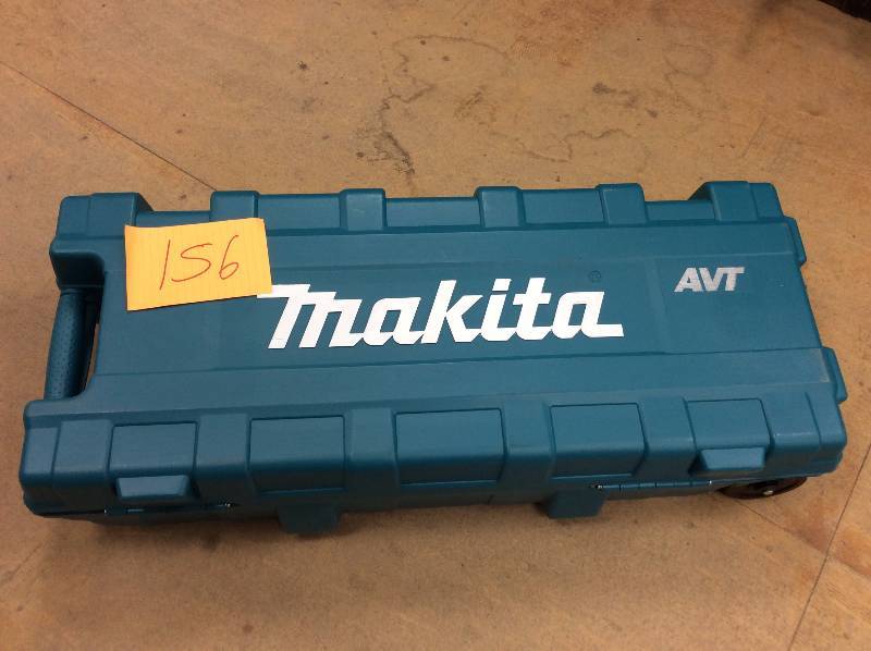 lot 156 image: Makitas hard-hitting HM1214C 27 lb. Breaker Hammer open box not used