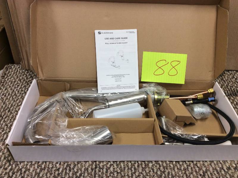 lot 88 image: Glacier Bay Single Handle Pull Down Sprayer Kitchen Faucet Stainless Steel Not used