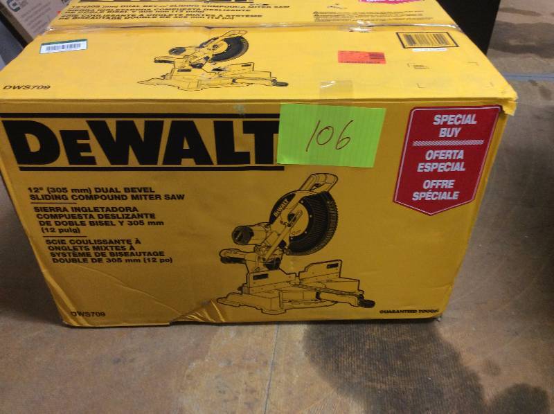 lot 106 image: Dewalt 15 Amp 12 in. Dual Bevel Sliding Compound Miter Saw not used DWS709