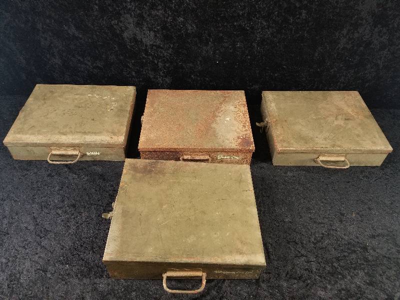 lot 49 image: Lot - Metal Army () Boxes, 1945 Military Blister Gas Individual Cover Packs, Etc