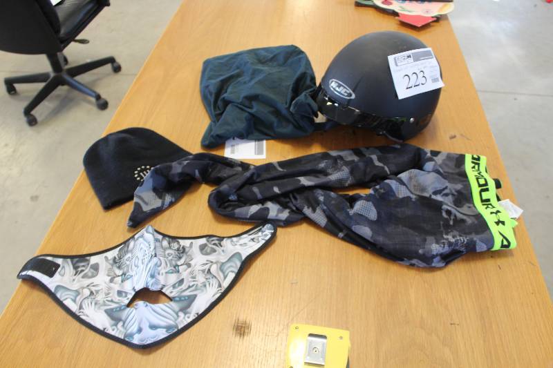 lot 223 image: Helmet Lot Includes Helmet Bay Face Mask, Underarmour Shirt, Knit Cap, And More