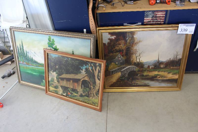 lot 339 image: Lot of (3) Signed Framed Art Includes Trees by Woollums 1986, Covered Bridge by Paul Detlefsen, Stone Bridge by Olive Jacobs