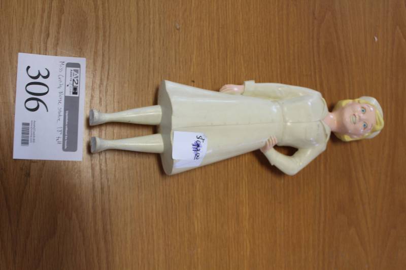 lot 306 image: Miss Curity Nurse Statue