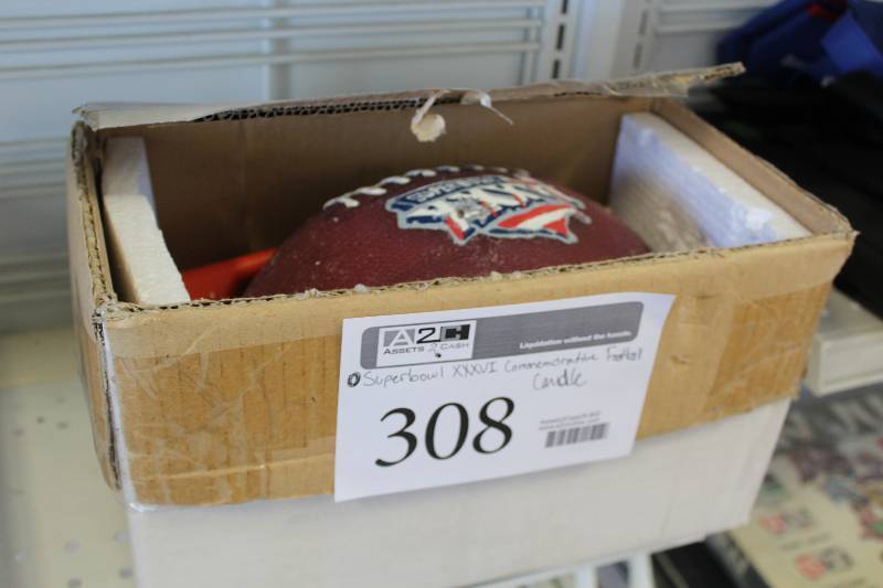 lot 308 image: Superbowl XXXVI Commemorative Football Candle w Tee