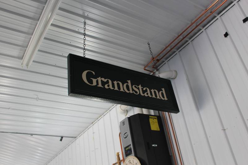 lot 530 image: Lot of (3) Signs, Banners Includes Grandstands, Clubhouse, Patriotic Banner
