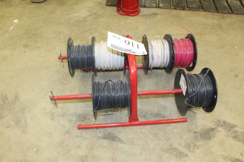 lot 116 image: Spools of Wire on Wire Dispenser Rack