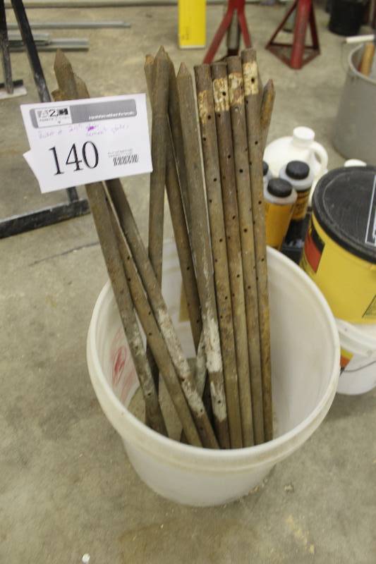 lot 140 image: Bucket Lot of 24in. Cement Stakes