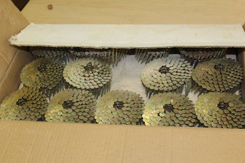 lot 163 image: Box Lot of (Approximately 43) Eagle 15-Degree 1-12in.x.120 Electrogalvanized Smooth Shank Coil Roofing Nail Bundles
