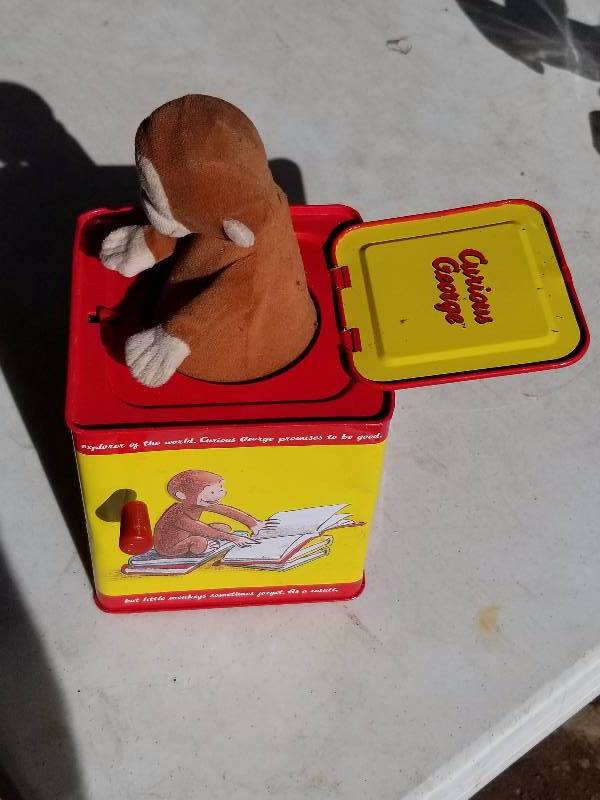 lot 13 image: Curious george jack in the box